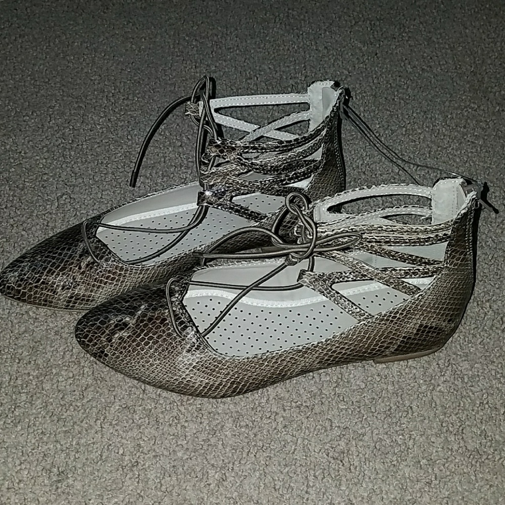 Snake skin print lace up ballerina flats.   Rialto