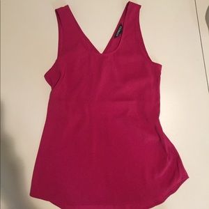 A cranberry top with crisscross in the back