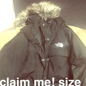 Black North Face jacket.
