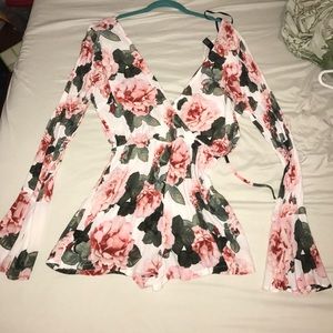 Never worn long-sleeved romper.