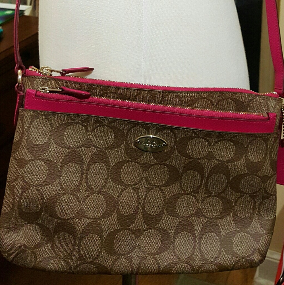 Tan East/West Coach purse