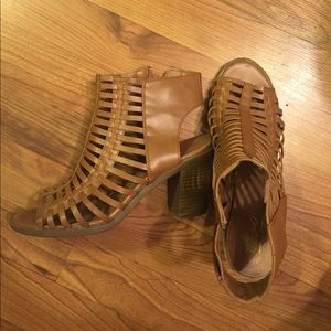 Brown cage sandals with a heel