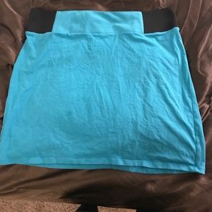 Blue skirt with black elastic around the waist