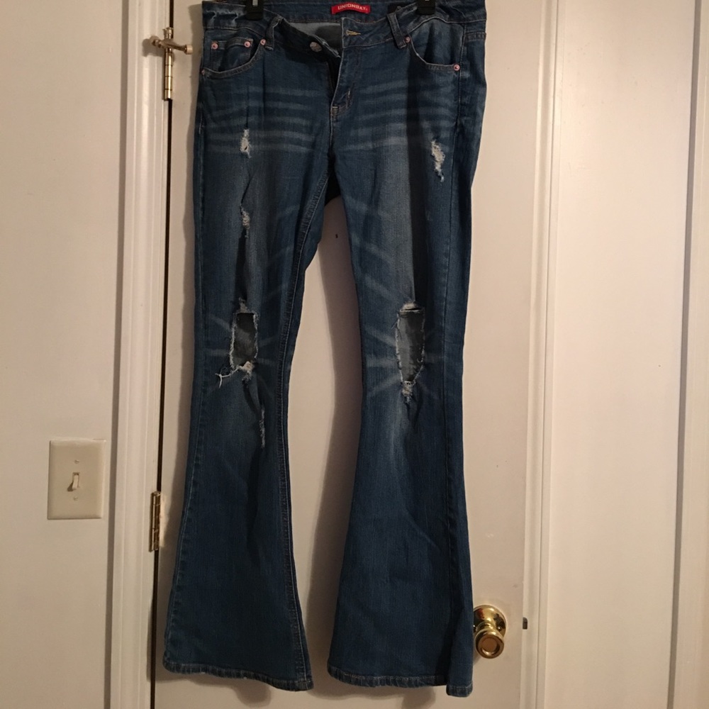 Distressed flare leg jeans