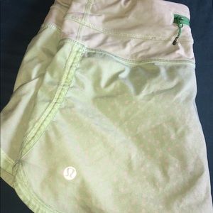 Lululemon green polka dot speed shorts.