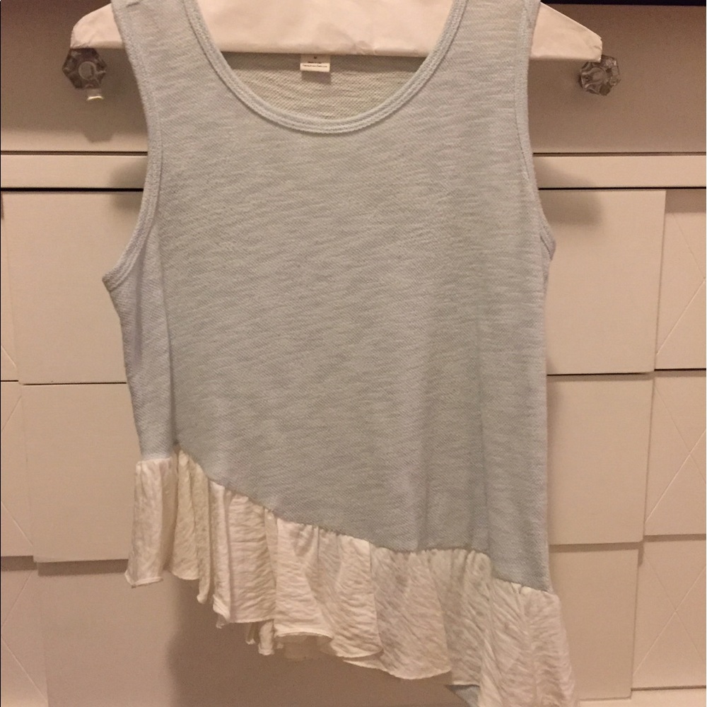 Peplum sleeveless knit top