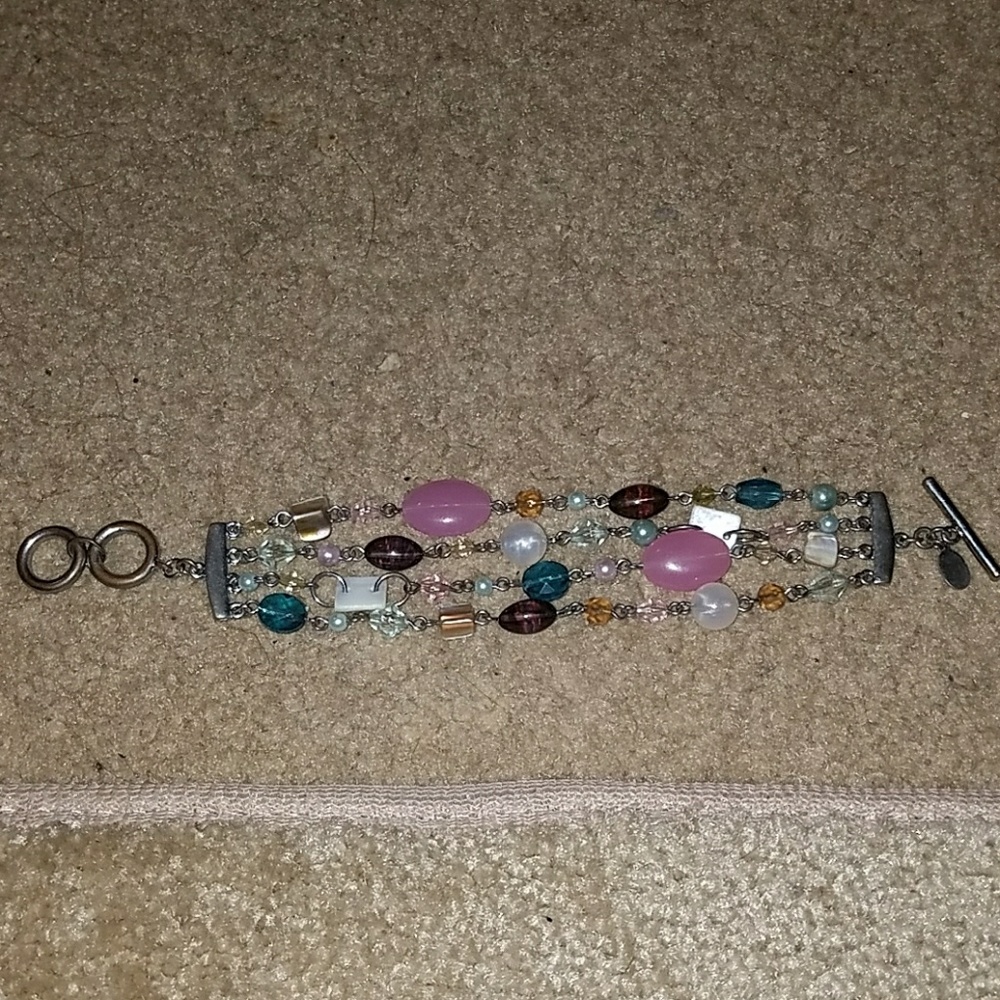 Bracelet w/ different colors and beadings.