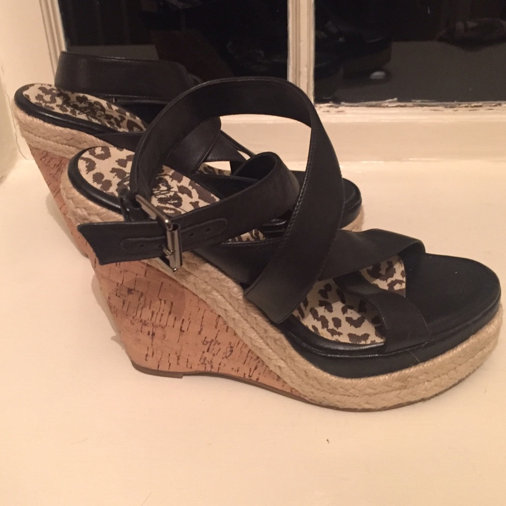 Black leather summer wedge sandal with cork heel.