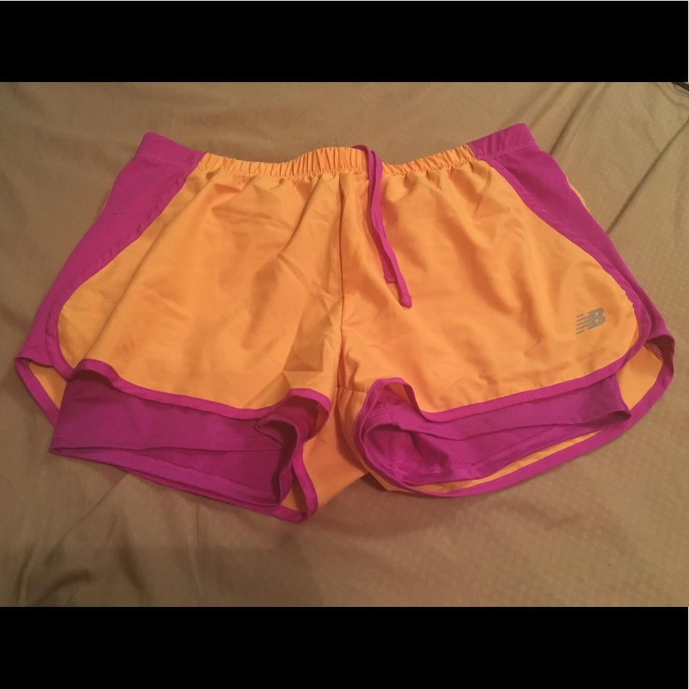 Orange and purple running shorts