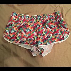White and multicolored running shorts