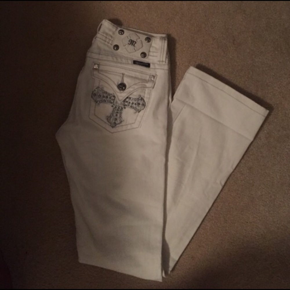 White Miss Me jeweled bootcut jeans.