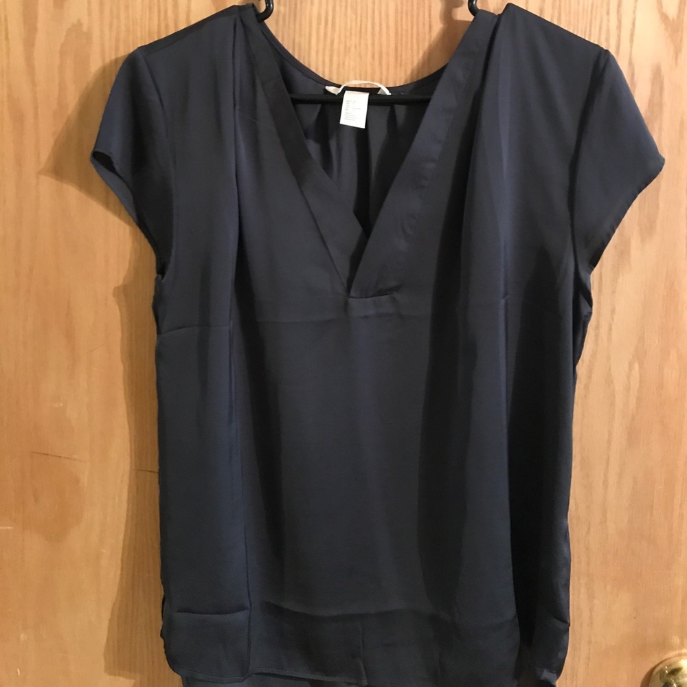 Grey blouse.