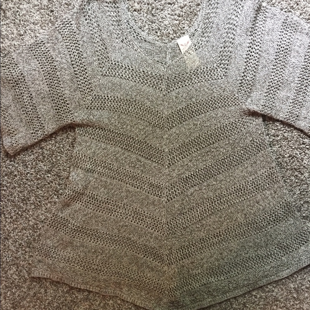 Assymetrical top brown/cream colors.  V neck