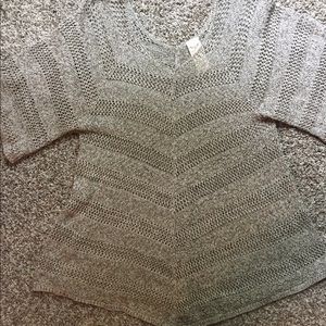 Assymetrical top brown/cream colors.  V neck