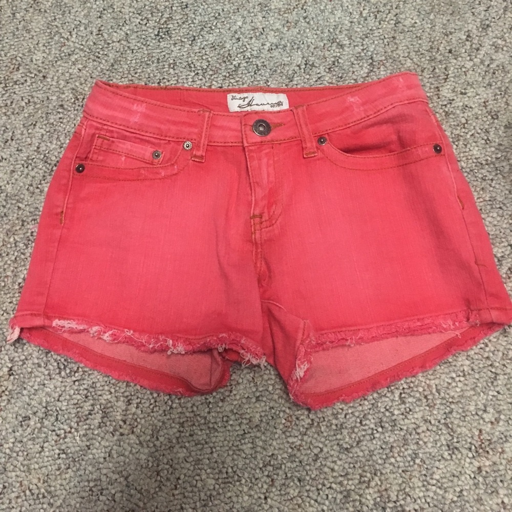 Coral denim cutoff shorts