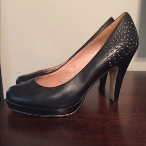 Studded black platform heels