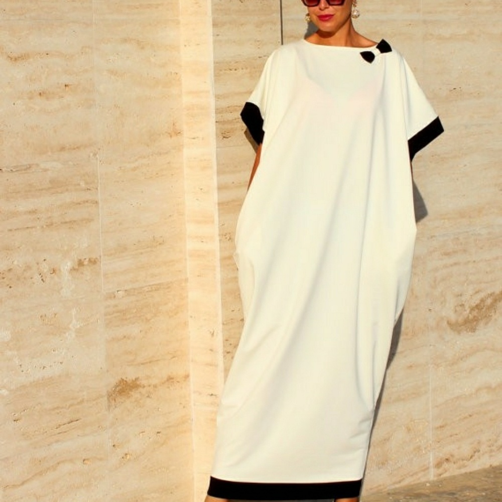 Elegant cream color caftan black trim