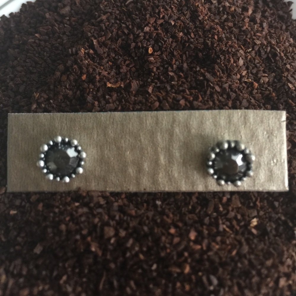 Black stone studs with detailed silver edge