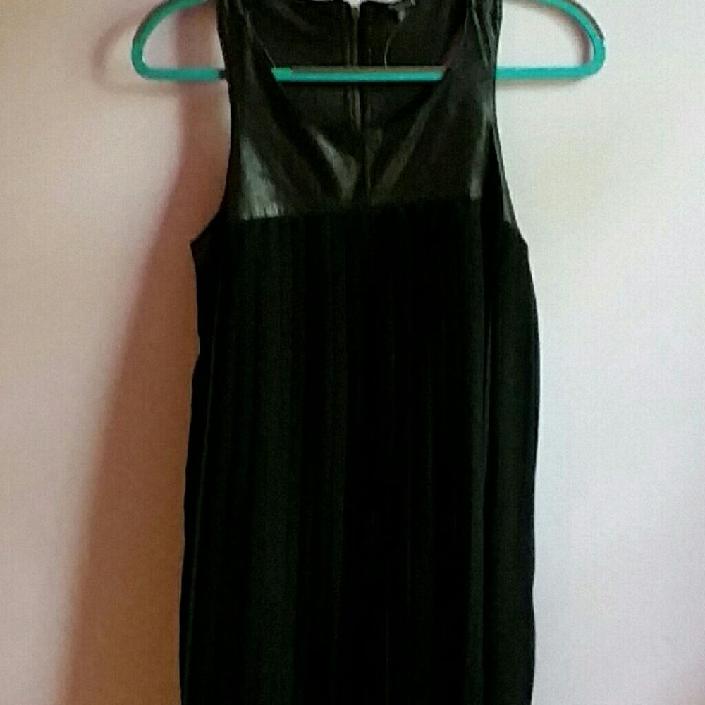 A black pleated sheer dress with sleeveless  top