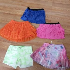 4 skirts, 1 shorts, girls, size 7-8