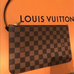 Louis Vuitton never full wristlet