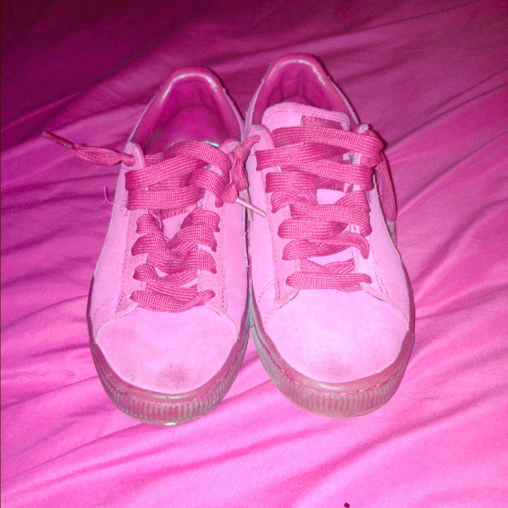 Worn pink suede puma classics