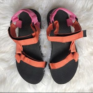 Orange and pink Teva sandals