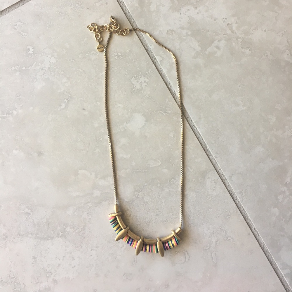 Never worn, goes with anything!