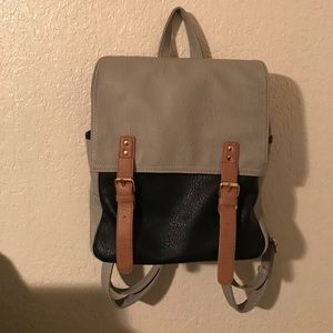 Gray and black faux leather backpack