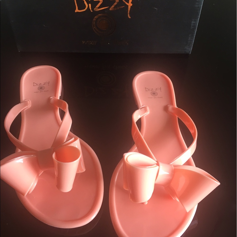 Brand new thong sandals in light coral.