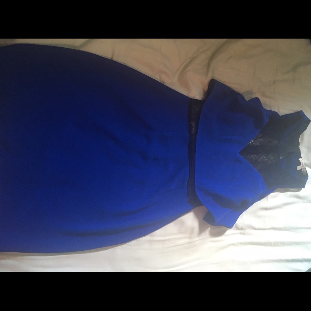 Blue peplum and black lace dress