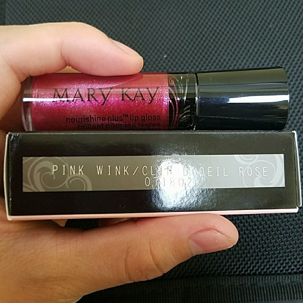 Pink wink nourishine plus lip gloss.