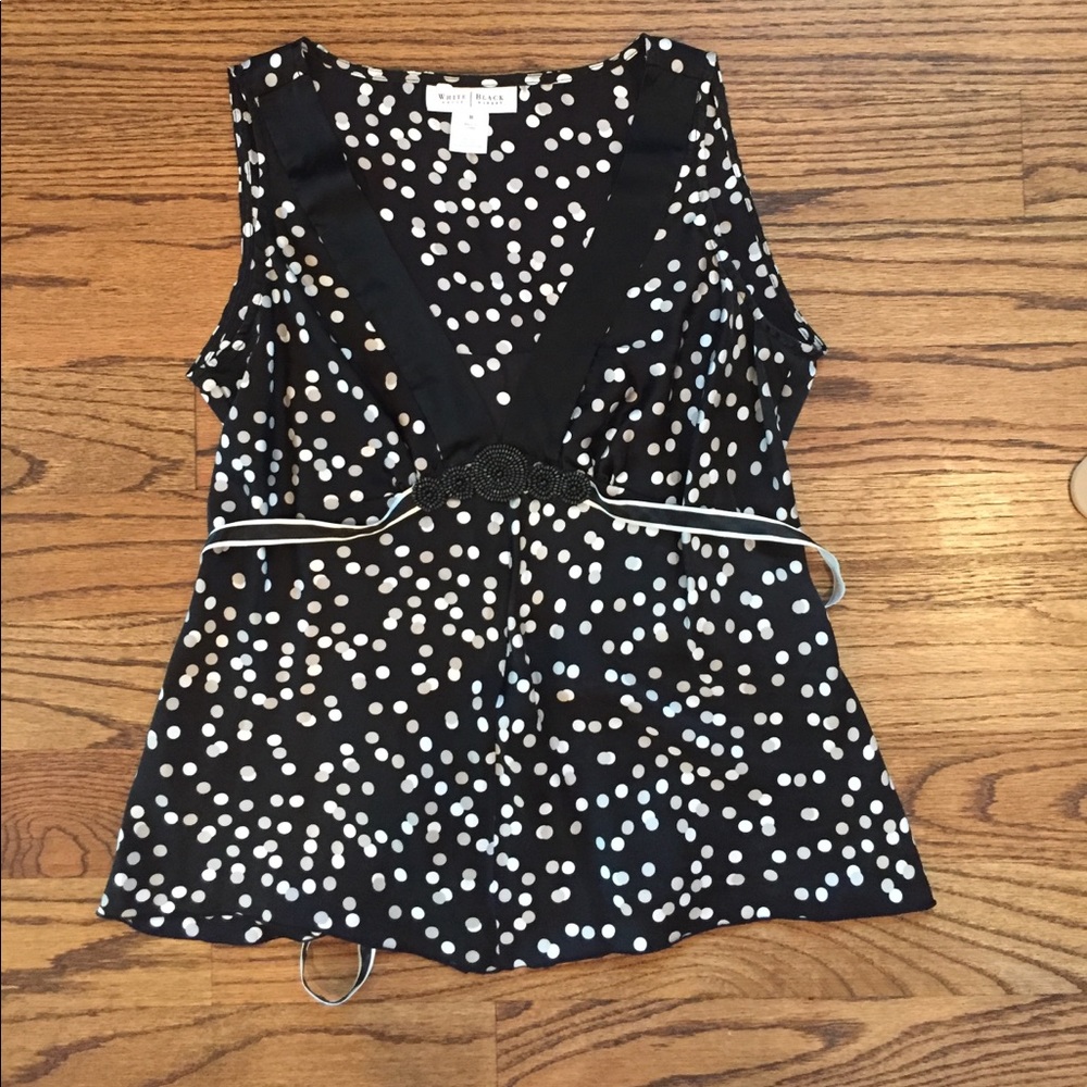 Beautiful silk blouse with beading detail on front