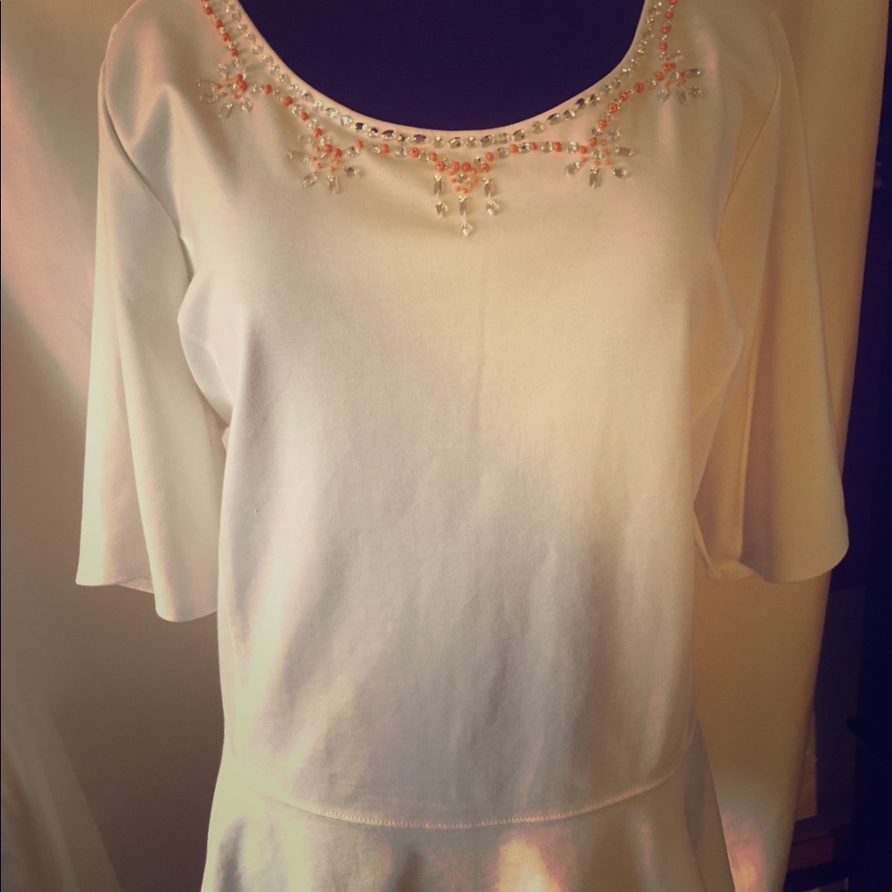Lane Bryant Cream colored peplum top with beading
