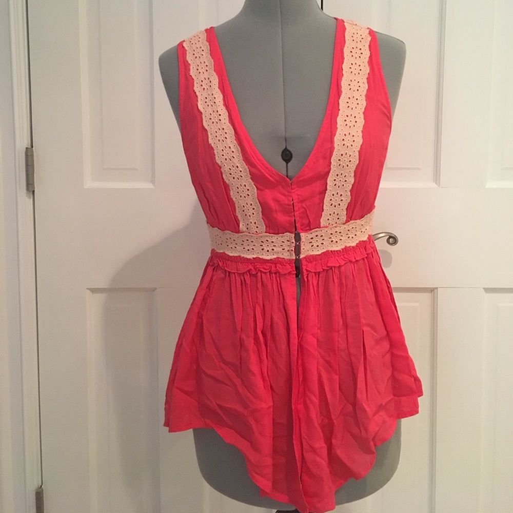 Pink shirt with cream lace detailing