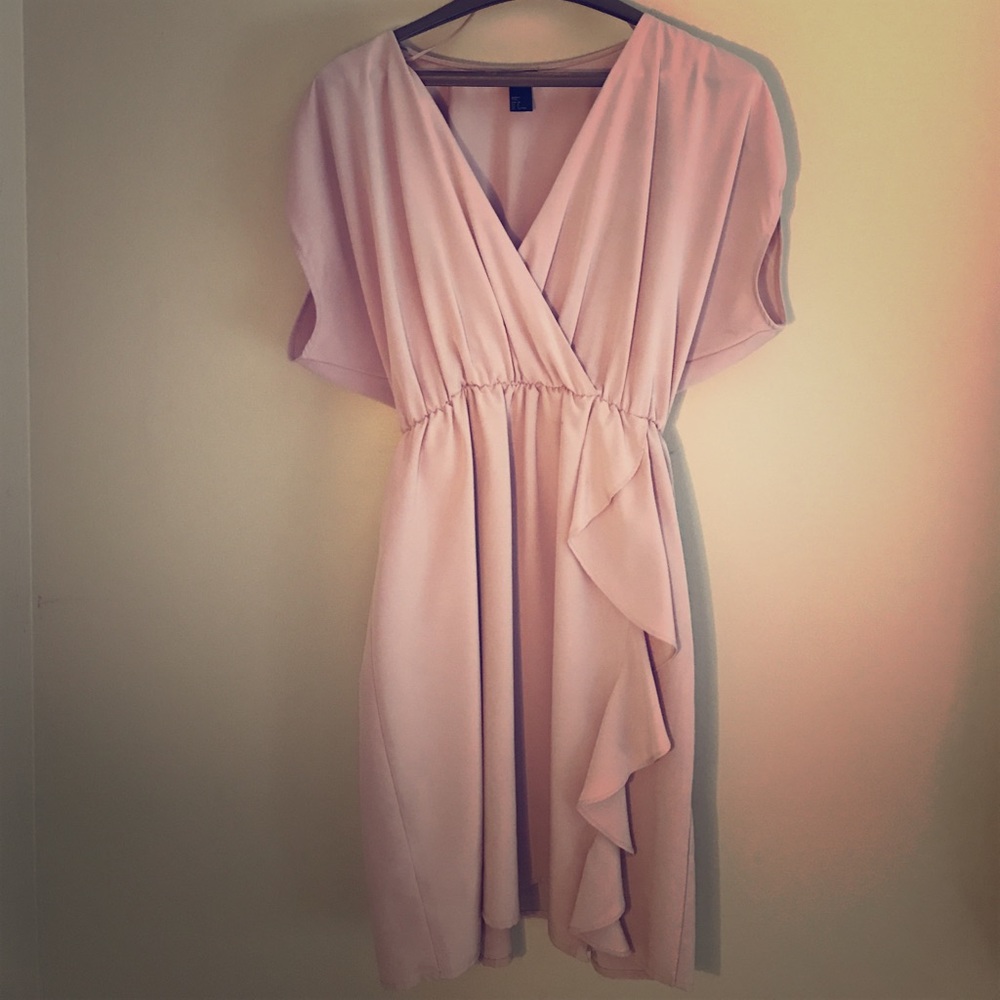 Pale pink dress.