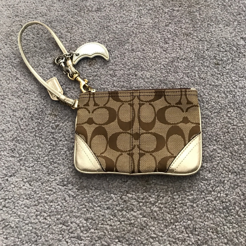 Brown and gold coach wristlet