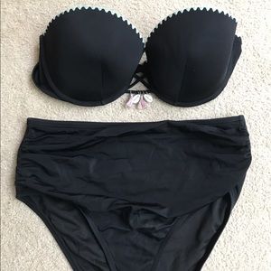 Two piece bathing suit with high waist bottoms.