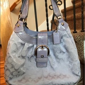 Beautiful purple COACH signature handbag