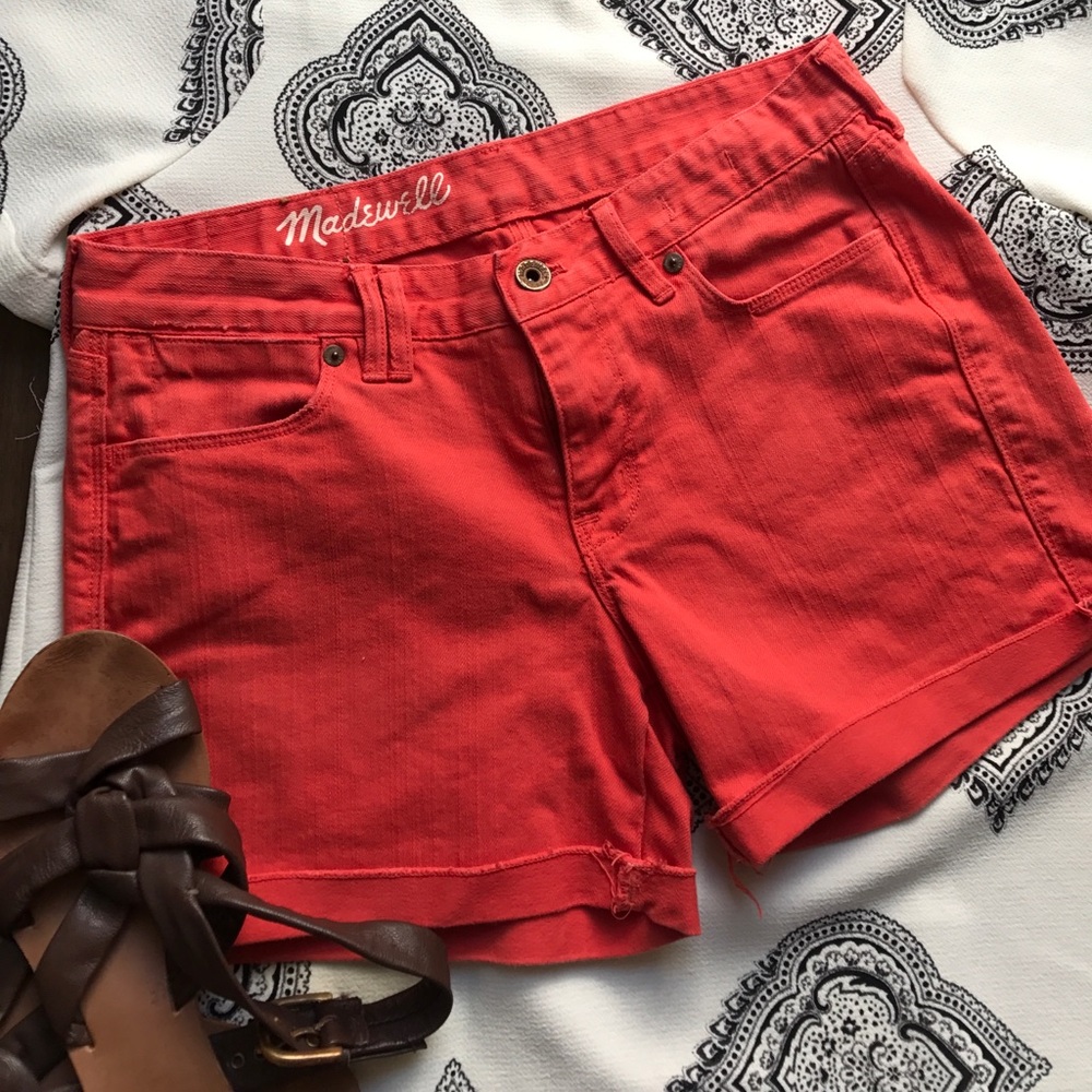 Madewell orange denim cutoff shorts.