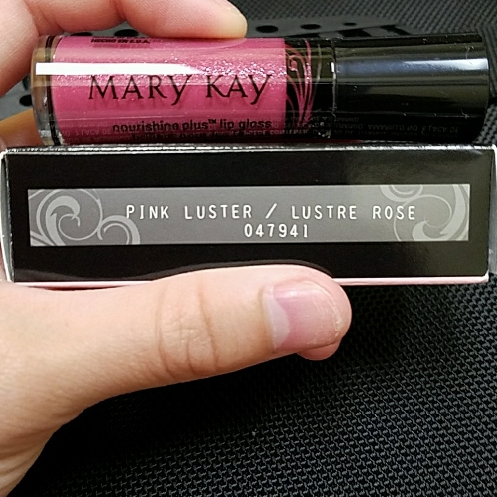 Pink luster nourishine plus lip gloss.