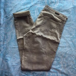 Distressed khaki skinny jeans