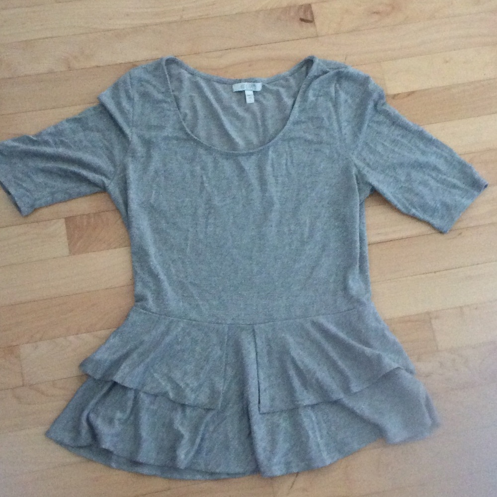 Sparkly silver peplum top