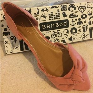 Pink suede pointed-toe flats