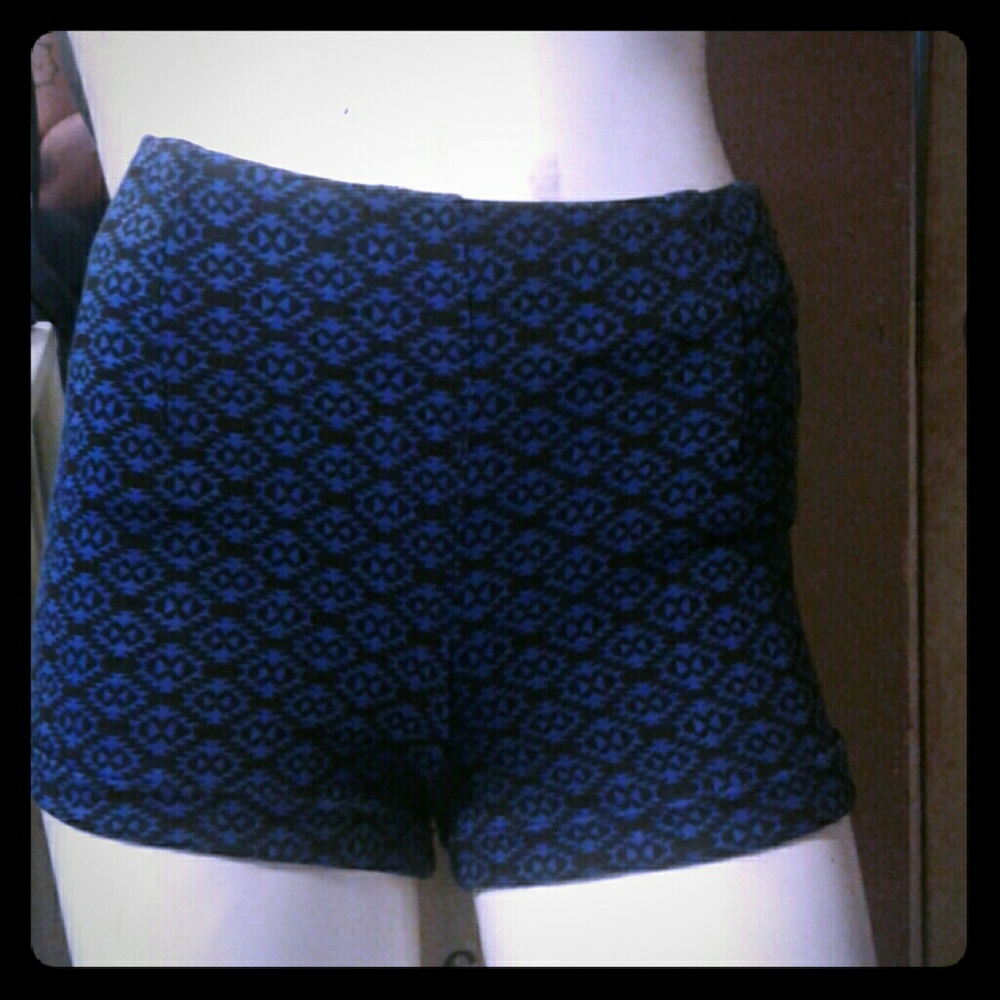 Blue with black shorts