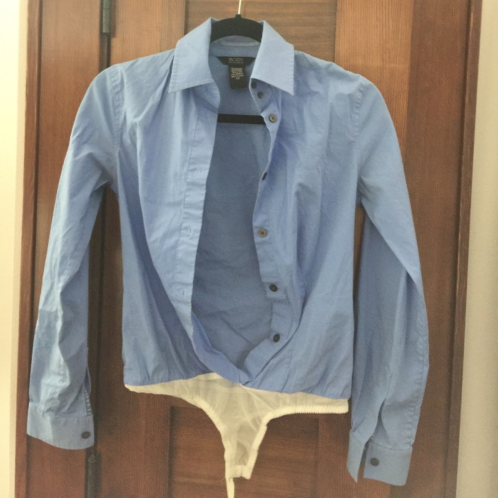 Professional blue body suit by Victoria Secret.