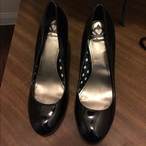 Pleather and polka dot black heels