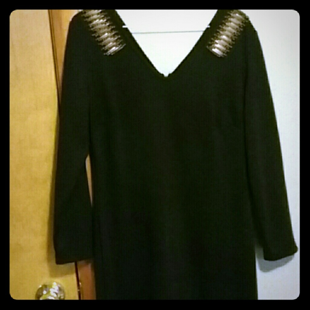 Dress with decorations on each shoulder