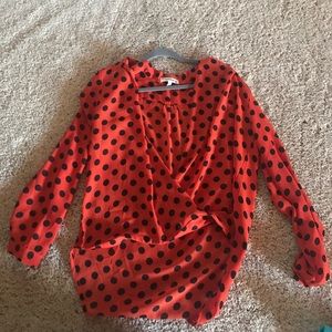 Orange and black polka dot wrap shirt