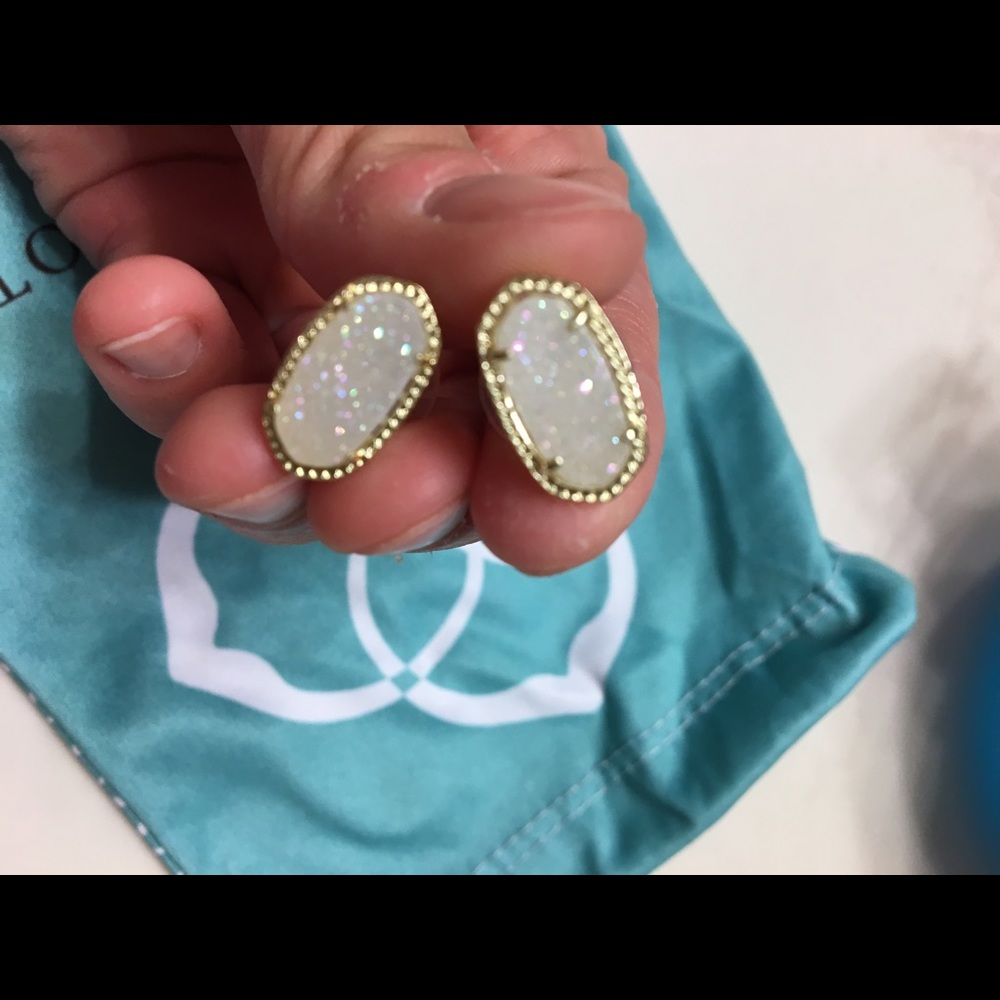 Kendra Scott iridescent drusy Ellie earrings.